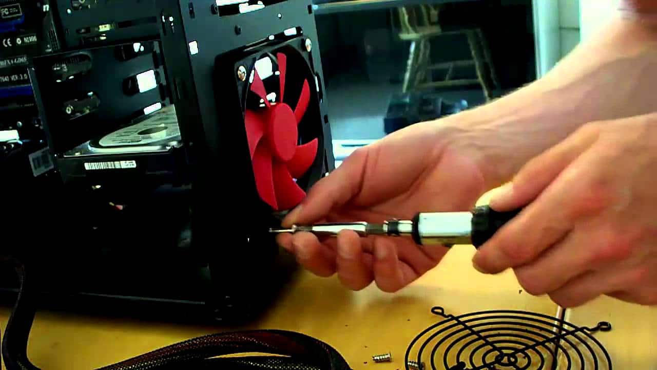 Install the pc fan using a Screwdriver