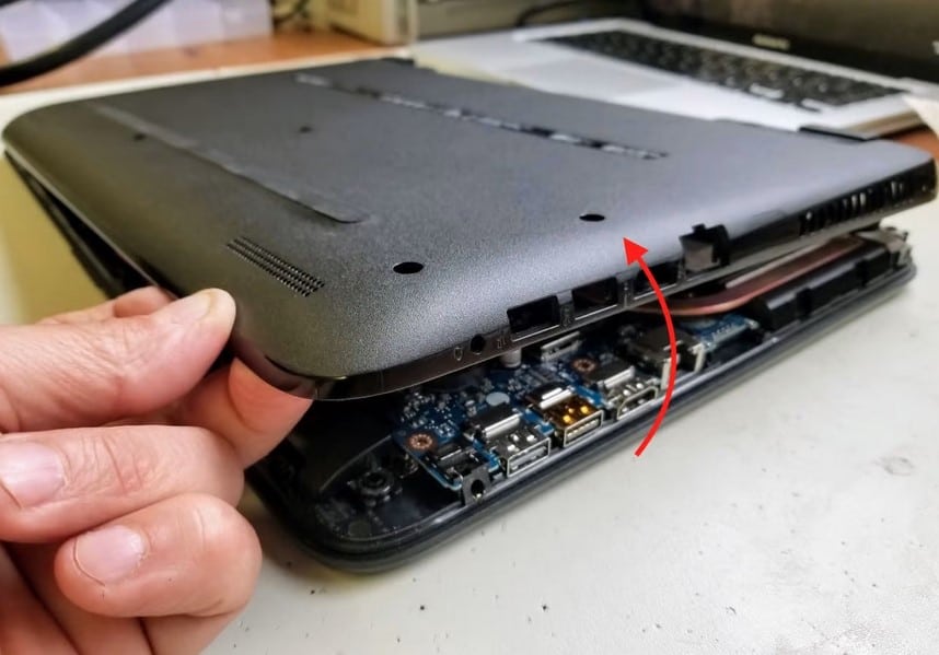 Open up your laptop's case carefully
