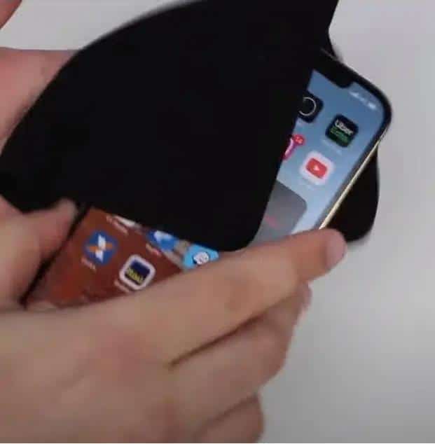 iPhone 12 model using a lint-free and soft cloth